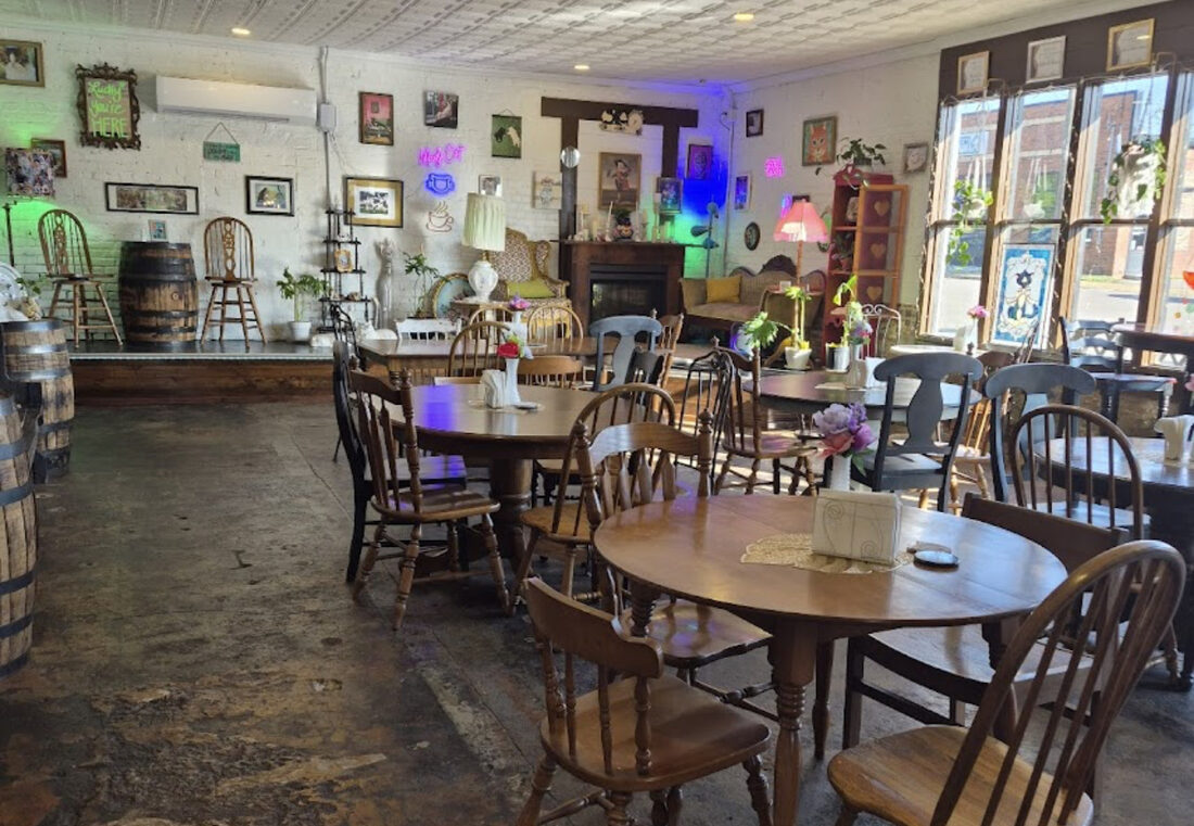 Dining area with vintage decor at Moody Cat Coffee Shop